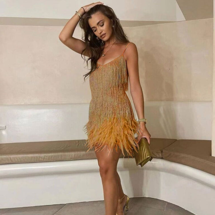 Evening dress with narrow straps and figure-hugging cut