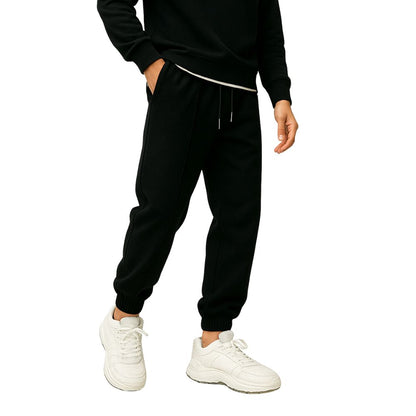 Loose-fitting men's jogging pants with elastic waistband and cuffs