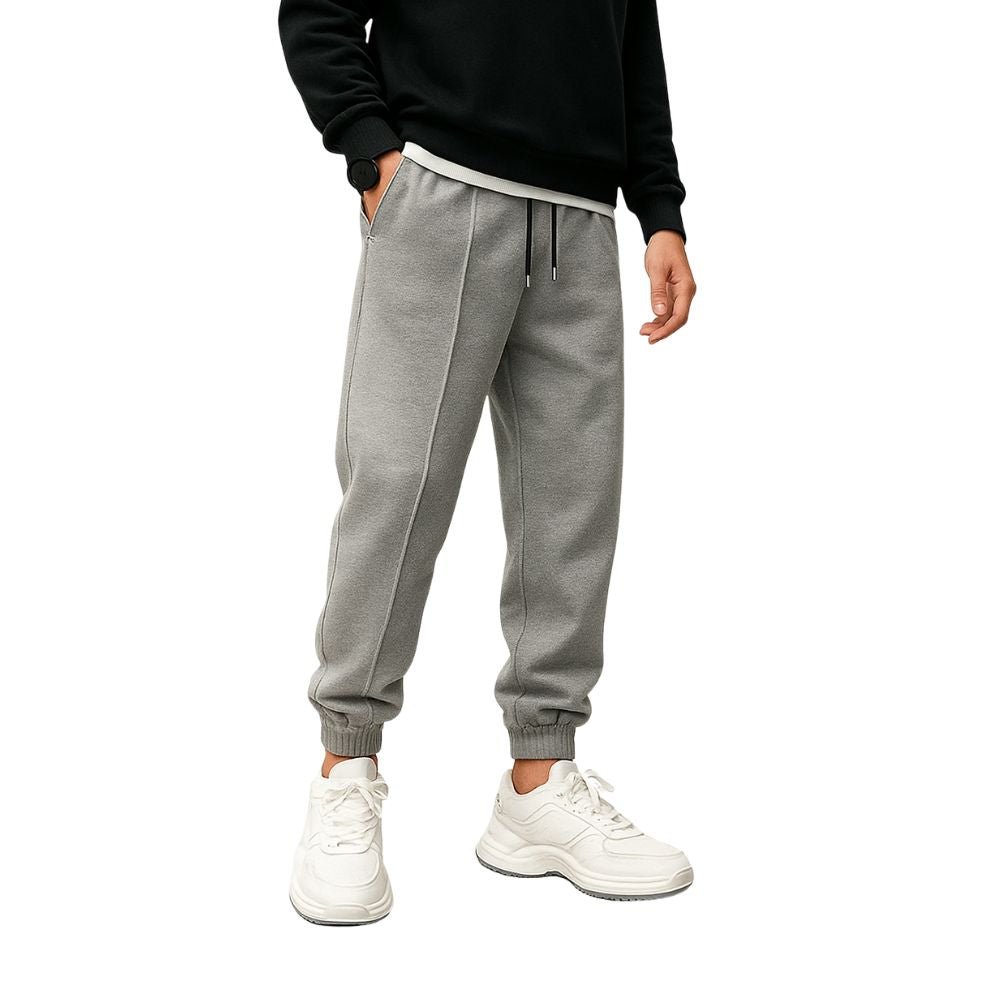 Loose-fitting men's jogging pants with elastic waistband and cuffs
