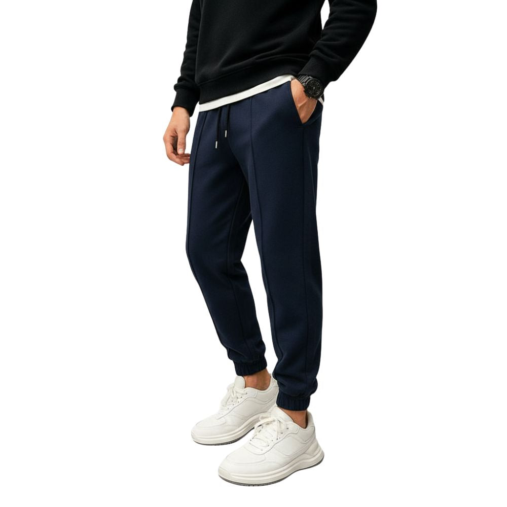 Loose-fitting men's jogging pants with elastic waistband and cuffs