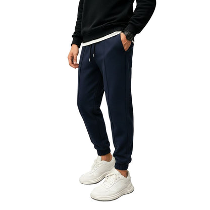 Loose-fitting men's jogging pants with elastic waistband and cuffs